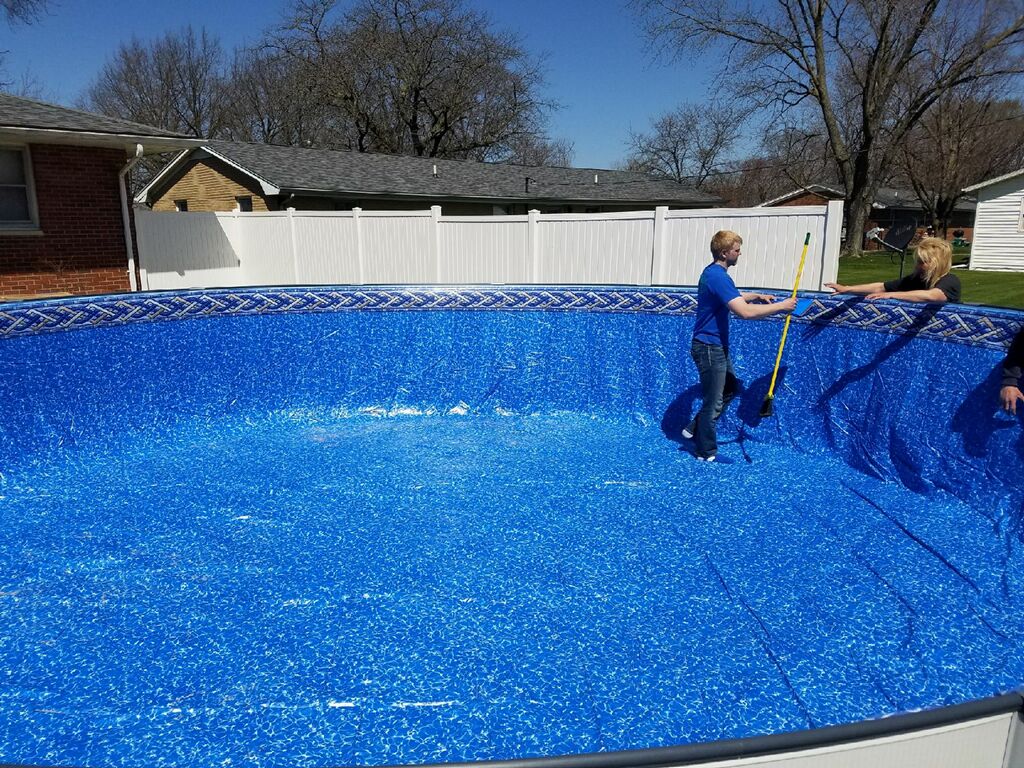 Our team is seen here installing a new vinyl liner on an above ground pool. We work hard to ensure you have the right information from beginning to end. For example, did you know it's better to have a beaded liner instead of an overlap liner? This ensures that if you build a deck around your pool that you don't pinch the liner and it's easier to service & replace later on!