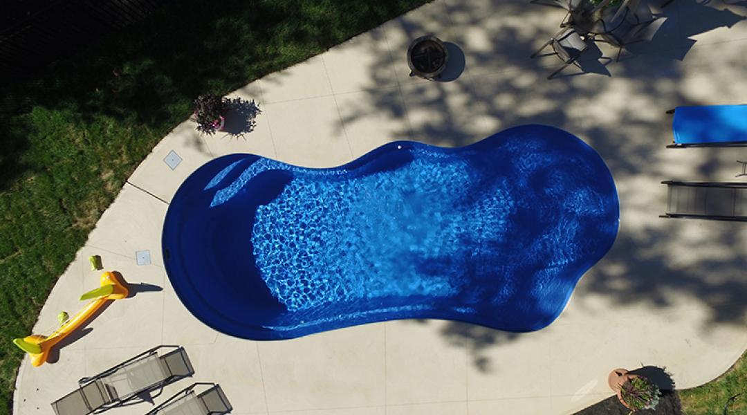 This Fantasy Model is one of eight choices that you have when you shop the Imagine Fiberglass Pool line. Imagine Pools manufactures only eight different shapes so that they can make each model perfect. They find that utilizing a streamline process of consistent molds allows their staff to emphasize perfection. The result: you receive the very best fiberglass shell available on the market today!