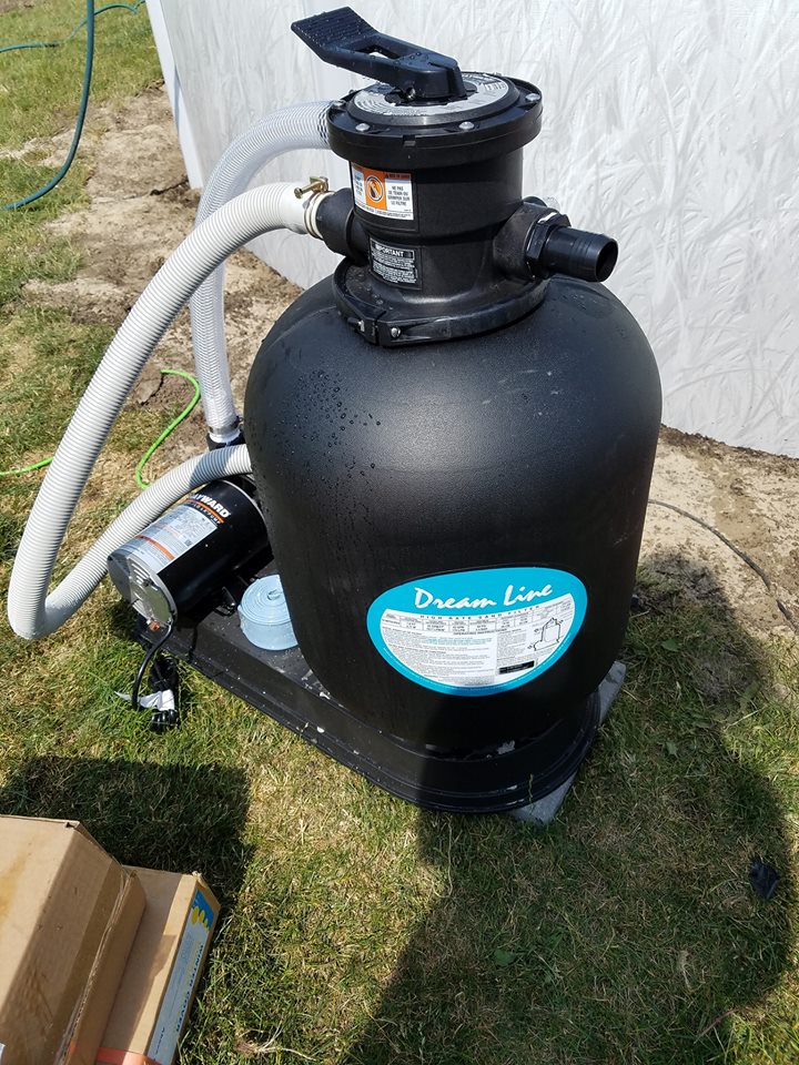 We use a Dreamline Filter System for all of our Above Ground Pool installations. This equipment package utilizes a sand filter, 1.5 HP pump and a 110V outlet. This is perfect for any backyard that doesn't want to hire a licensed electrician to install a 220V electrical line (another cost saving measure that these pools offer). 