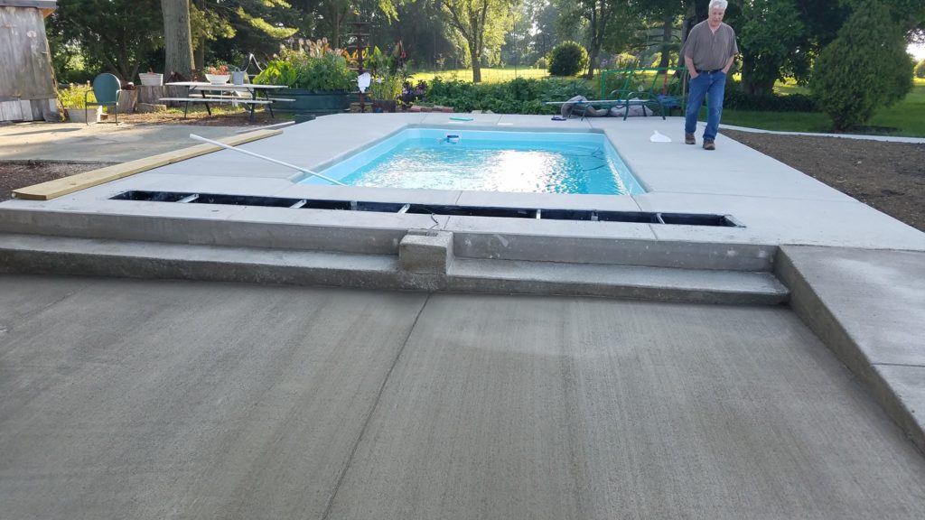 We have made some impressive headway and completed the fiberglass pool installation (if you've been following our blog). The final stages of this project were pouring our concrete pool deck, cleanup & pool startup. Now this home owner has a beautiful fiberglass swimming pool to enjoy for many warm days outside!