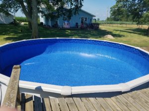 We are hard at work this week completing the installation on 4 new above ground swimming pools! We have been truly blessed this year with some tremendous growth and we are very grateful for our loyal customers and new business! Let's take a look at this new 27' Round Nova Above Ground Pool Installation!